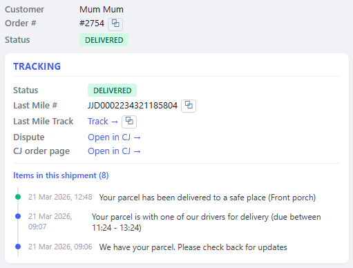 Order header with delivered status and tracking card including last-mile link and timeline